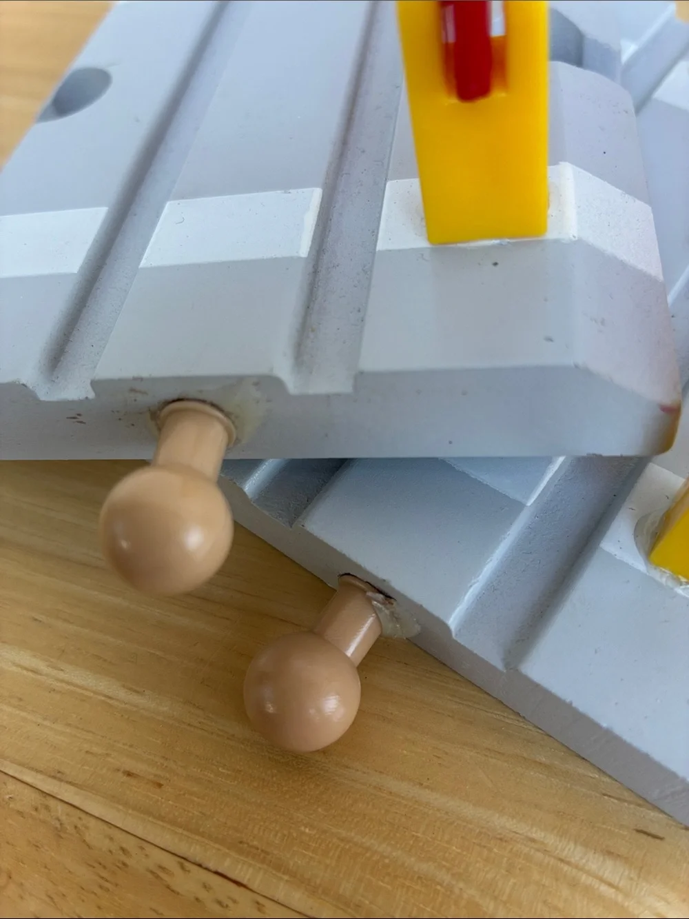 Wooden train tracks and light  Lot of 12 pieces. Great addition to your set!